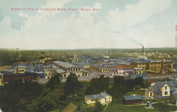 Elevated view of the plant and residential area, with smokestacks. Caption reads: "Birds-eye View of Fairbanks Morse Plant, Beloit, Wis."