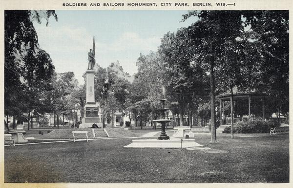City Park with the soldiers' and sailors' monument, a fountain, gazebo, and several park benches. Caption reads: "Soldiers and Sailors Monument, City Park, Berlin, Wis."