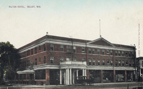View of the Hilton Hotel with a stagecoach parked near the entrance. Caption reads: "Hilton Hotel, Beloit, Wis."