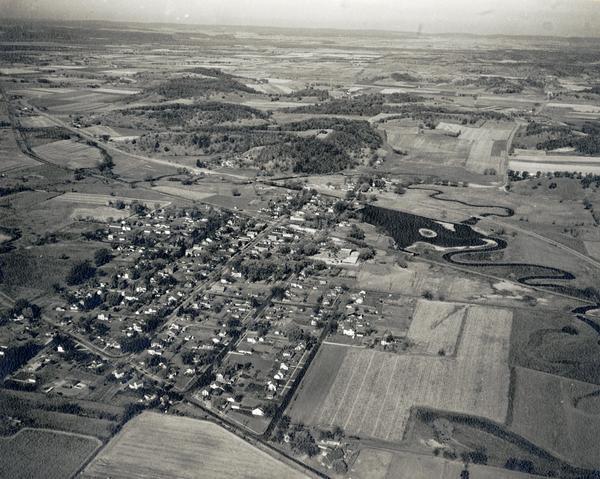 Aerial view of downtown, including river.