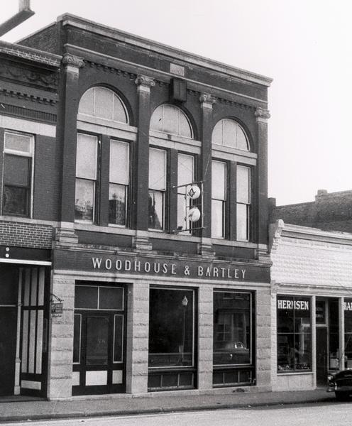 The building was erected after a fire which destroyed most of the Bloomington business section in 1897. The bank was acquired by Peter Woodhouse and Patrick Bartley in 1883, from William B. Clark and William Humphrey, who had established it in 1872. The bank is still in operation, although now owned wholly by the Bartley family.