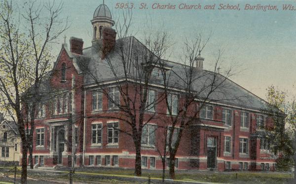 Exterior of the Saint Charles Church. Text reads: "5953 St. Charles Church and School, Burlington, Wis."