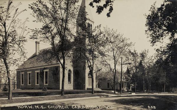 View of Methodist Episcopal church from the street. Caption reads: "Norw. M.E. Church Cambridge Wis."