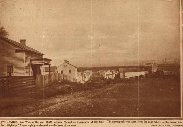 Main Street in Cedarburg. Includes text which reads: "Cedarburg, Wis., in the year 1850, showing Main Street as it appeared at that time. The photograph was taken from the point where, at the present time, Highway 57 turns slightly to descend into the heart of the town."