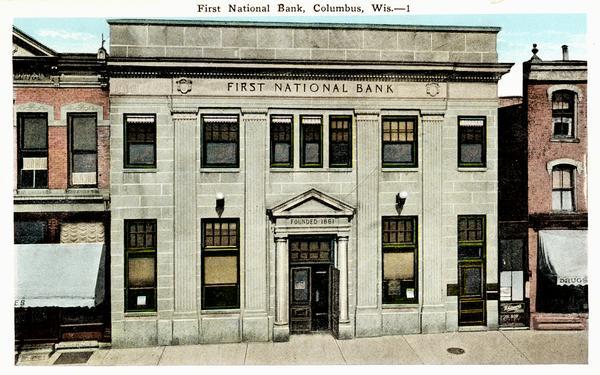 First National Bank, founded in 1861. Caption reads: "First National Bank, Columbus, Wis."