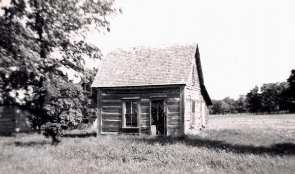 Small log house near Edgewood School in Deer Park.