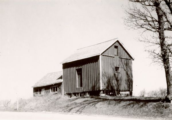 Niels-Larsen granary on its original site, before its removal to Old World Wisconsin, Eagle, Wis;, where it was erected on the Norwegian site.