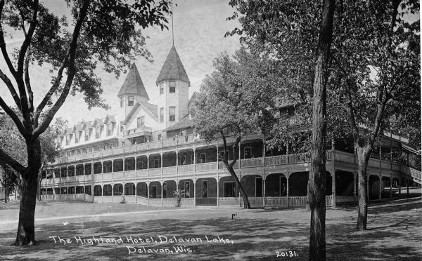 View of the Highland Hotel on Delavan Lake. Caption reads: "The Highland hotel, Delavan lake, Delavan, Wis."