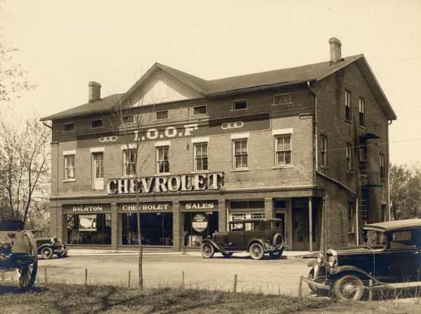Exterior view of the Chevrolet dealership in Delavan in the Independent Order of Odd Fellows Hall. During the 1860s and 1870s the building was known as the Park Hotel and it was frequented by circus people.