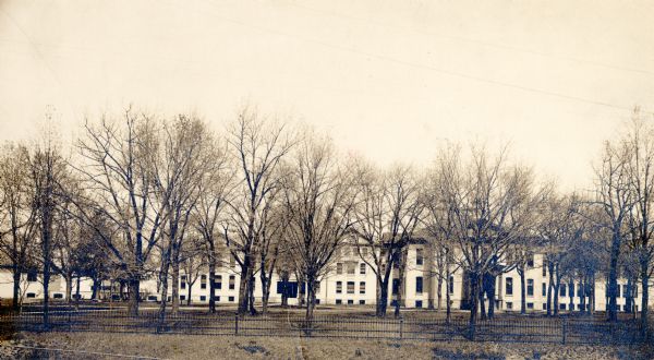 Exterior view of School for the Deaf. School also called State Institute for the Deaf and Dumb. Walker Hall, which is on the right, was added to the school in 1912.