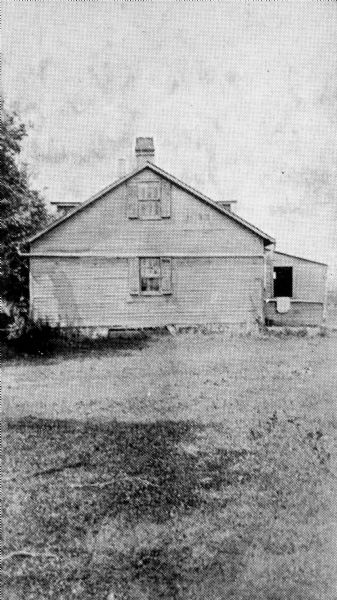 The house and printing office of James D. Reymerts at Denoon Lake.