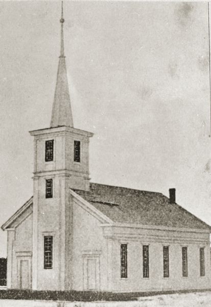 View of the church. The building was later made larger by extending it at the rear, and still later it was replaced by a stone church building, which was destroyed by fire and replaced with the building, which was standing in 1931.