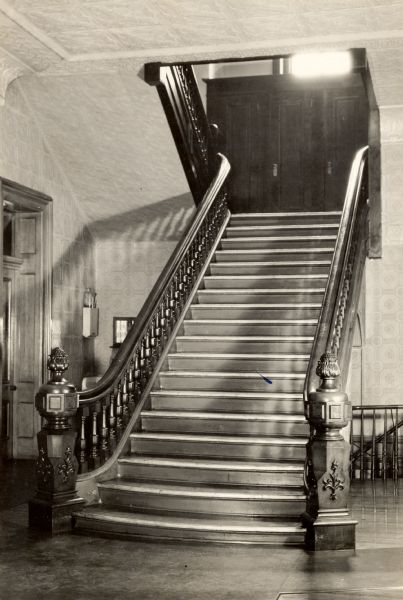 Walnut staircase inside the Eau Claire County Court House.