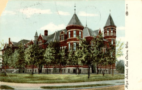View from street toward the high school. Caption reads: "High School, Eau Claire, Wis."