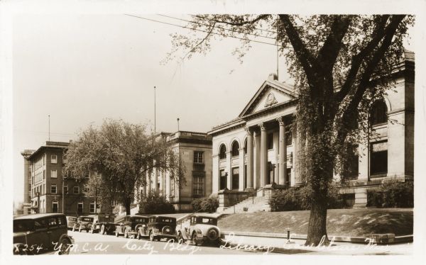 Eau Claire Public Library about 1930-1935. The building in the left background is the Y.M.C.A.