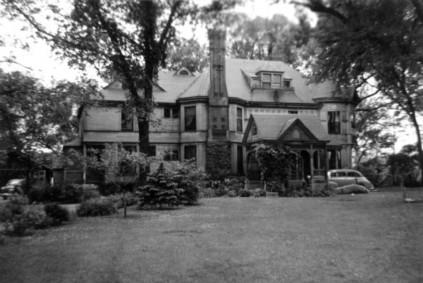 Wheeler house with a porte cochere in the foreground.