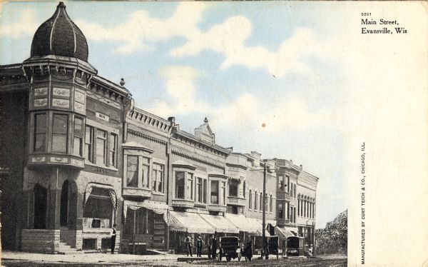 View of the buildings along one side of Main Street. Caption reads: "Main Street, Evansville, Wis."