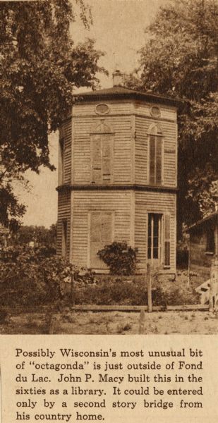 View of a two-story octagonal structure amongst trees. Caption reads: "Possibly Wisconsin's most unusual bit of 'octagonda' is just outside of Fond du Lac. John P. Macy built this in the sixties as a library. It could be entered only by a second story bridge from his country home."