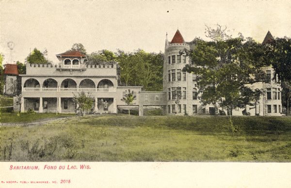 View of St. Mary's Spring Sanitarium, a rest resort with hot springs. In the 1920's, the sanitarium is listed in directories as St. Mary's Spring Academy for Young Girls. Caption reads: "Sanitarium, Fond du lac, Wis."