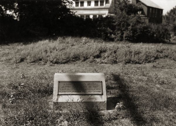 View of the panther intaglio effigy mound marker, located on Highway 106 West. The text on the marker reads: "Indian Intaglio Effigy; Panther Type, Length 125 Feet; Surveyed by Increase A. Lapham, 1850; Marked by Fort Atkinson Chapter D.A.R. 1920."