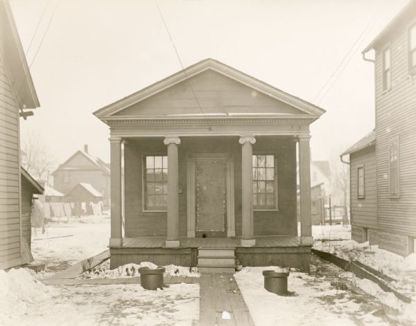 Front view of the Baird Law Office before reconstruction.