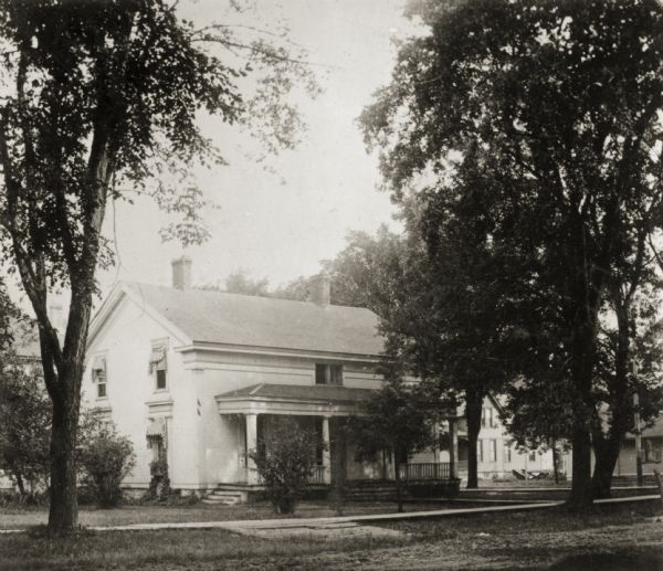 View of the Judge Stephen R. Cotton residence. The Cotton residence was located at the corner of Jefferson and Doty Streets.