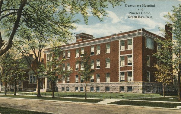 View across street toward Deaconess Hospital and Nurses' Home. Caption reads: "Deaconess Hospital and Nurses Home, Green Bay, Wis."