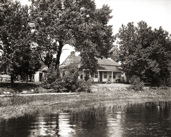 View of the Tank cottage before restoration on its original site.