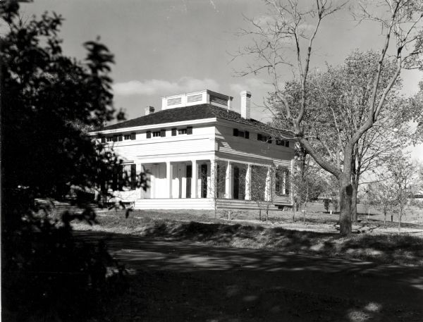 View of the Butternut House, a Kohler Foundation restoration project. The home was erected in the early 1850's by Charles W. Robinson, son-in-law of Sylvanus Wade. The Kohler Foundation has restored it as an example of family dwellings in the early days of Wisconsin statehood.