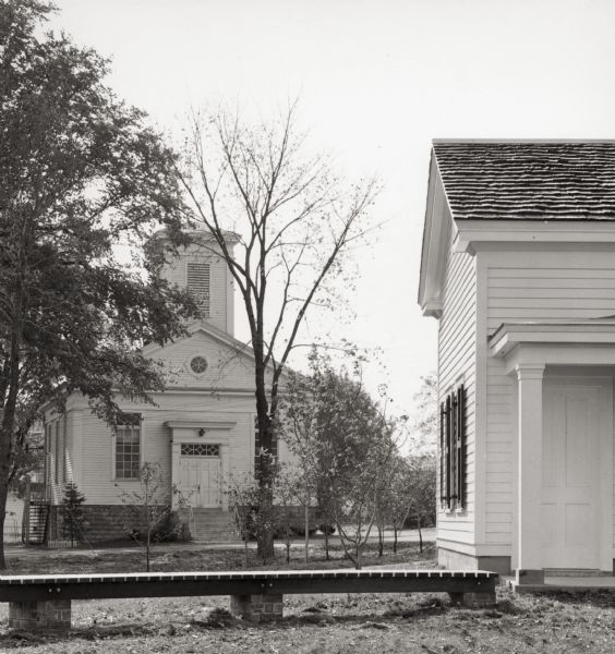 View of the First Methodist Church and the corner of the Service Building. The church was built in 1854 by Charles Robinson, the builder of Butternut House (located across the street from the church) and possibly the designer of the Old Wade House.