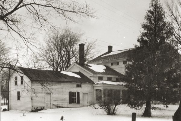 View of the east elevation of the Wade House. The Wade House, one of the earliest stagecoach inns in Wisconsin, was built between 1847 and 1851 by Sylvanus Wade. It became the most important stop on the plank road between Sheboygan and Fond du Lac.