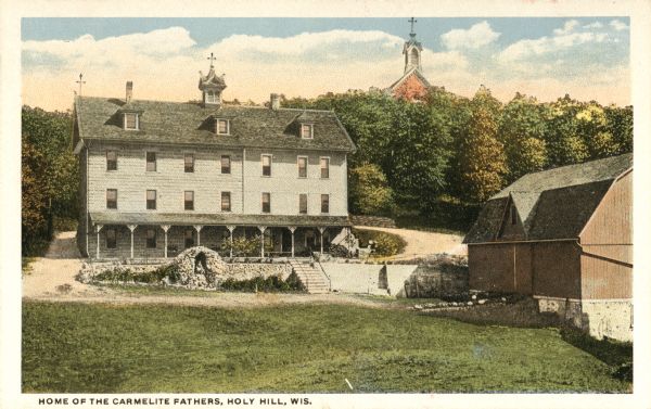 View of the Carmelite Fathers' home on Holy Hill. Caption reads: "Home of the Carmelite Fathers, Holy Hill, Wis."
