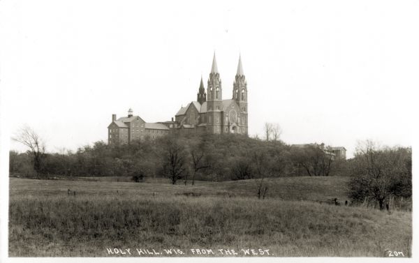 View of the Carmelite monastery on Holy Hill from the west. Caption reads: "Holy Hill, Wis. From The West."