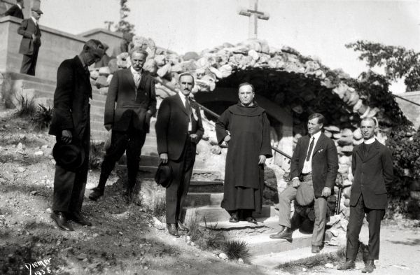 View of a Holy Hill visiting group including Charles E. Brown (left), archeologist of the State Historical Society of Wisconsin, and John S. Donald, Wisconsin Secretary of State.