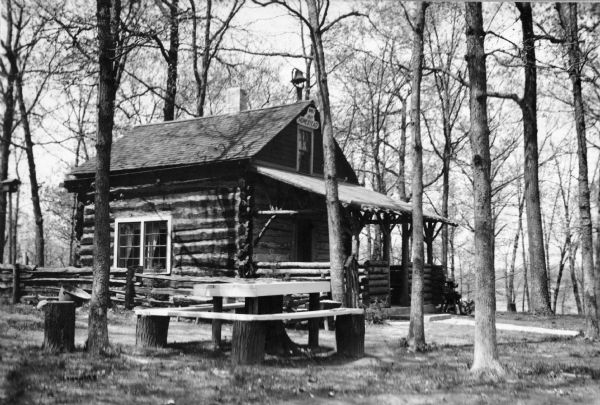 View of a log cabin in Colonel Heg Memorial Park. Built in 1837, the cabin was the homestead of the Even Hansen Heg family after they emigrated from Lier, Norway to Wisconsin in 1840.