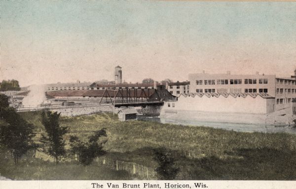 View of the Van Brunt plant. The Van Brunt Manufacturing Company began in 1860 when brothers George and Daniel Van Brunt patented a design for a combination seeder and cultivator. In 1861, the brothers' factory moved from Mayville to Horicon. Caption reads: "The Van Brunt Plant, Horicon, Wis."