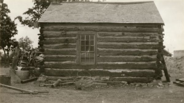 The York log school house was built in 1843. It was later used on the Pelty farm as a workshop.
