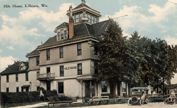View from road of the Hile House, Kilbourn (now Wisconsin Dells). There is a belvedere in the center of the roof. Caption reads: "Hile House, Kilbourn, Wis."