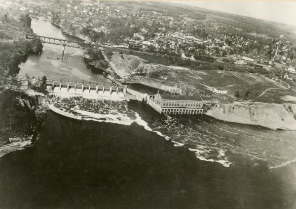 Aerial view of the Wisconsin Power and Light Company generating plant and dam.