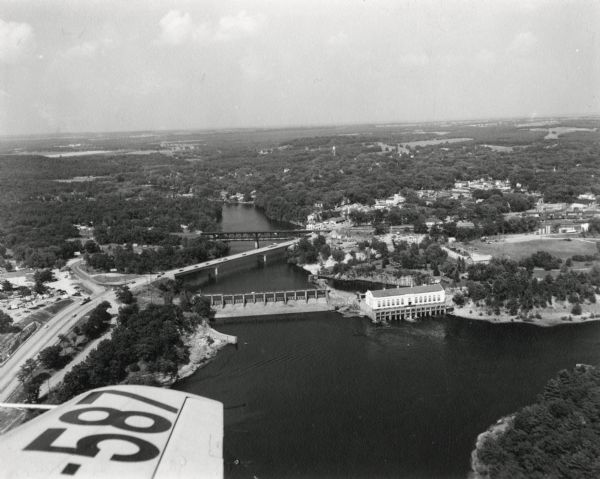 Aerial view of Wisconsin Dells. The wing of the airplane is in the left foreground.