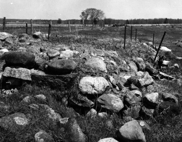 The foundation stones from the hardwood lumber mill constructed by F. Weyerhaeuser in 1885 on the north shore of Bowker Lake.