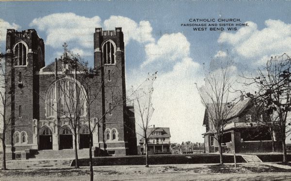 A Catholic Church in West Bend. Caption reads: "Catholic Church, Parsonage and Sister Home, West Bend, Wis."
