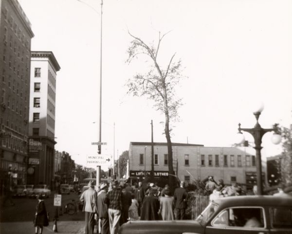 View of Jefferson Street in downtown Wausau.  In the foreground is the site of the old Marathon County Court House.