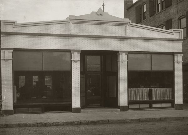 Front exterior view of the H.W. Youmans Waukesha Freeman newspaper office.