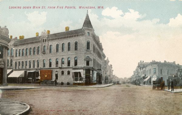 View down Main Street from Five Points. Caption reads: "Looking down Main St. from Five Points, Waukesha, Wis."