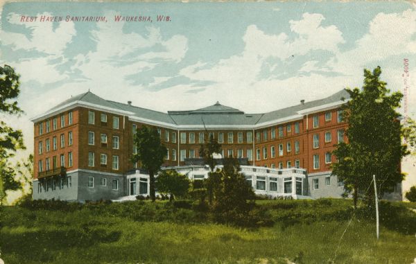 Exterior view of the Rest Haven Sanitarium. Caption reads: "Rest Haven Sanitarium, Waukesha, Wis."