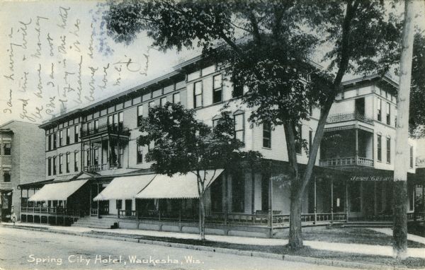 Exterior view of the Spring City Hotel. Caption reads: "Spring City Hotel, Waukesha, Wis."