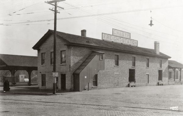 Exterior view of the Chicago, Milwaukee, and St. Paul freight station.