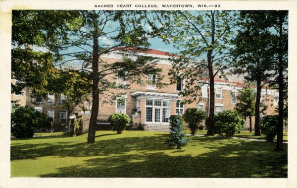 Exterior view of Sacred Heart College. Caption reads: "Sacred Heart College, Watertown, Wis."