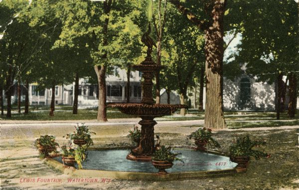 View of the Lewis Fountain located on West Main Street. Caption reads: "Lewis Fountain, Watertown, Wis."